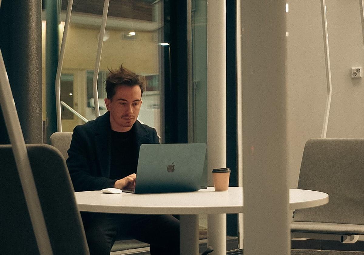 Student Sergio Martínez working on his computer.