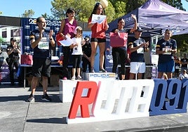 Podio de la carrera solidaria celebrada el año pasado.