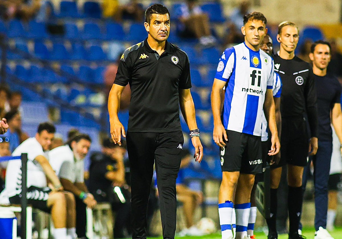 Rubén Torrecilla, junto al alicantino Carlos Mangada.