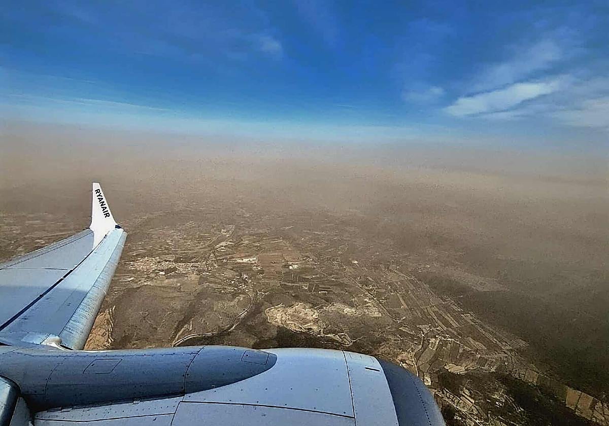 Cloud of red dust over the city of Alicante.