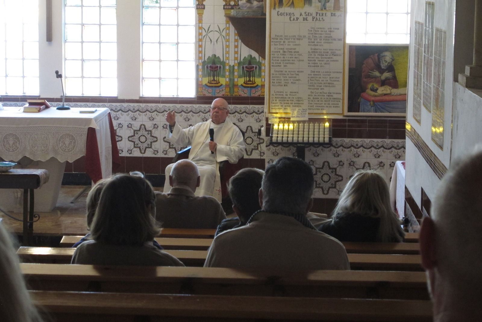 Father Oltra during the mass celebration at the Hermitage of Pare Pere.