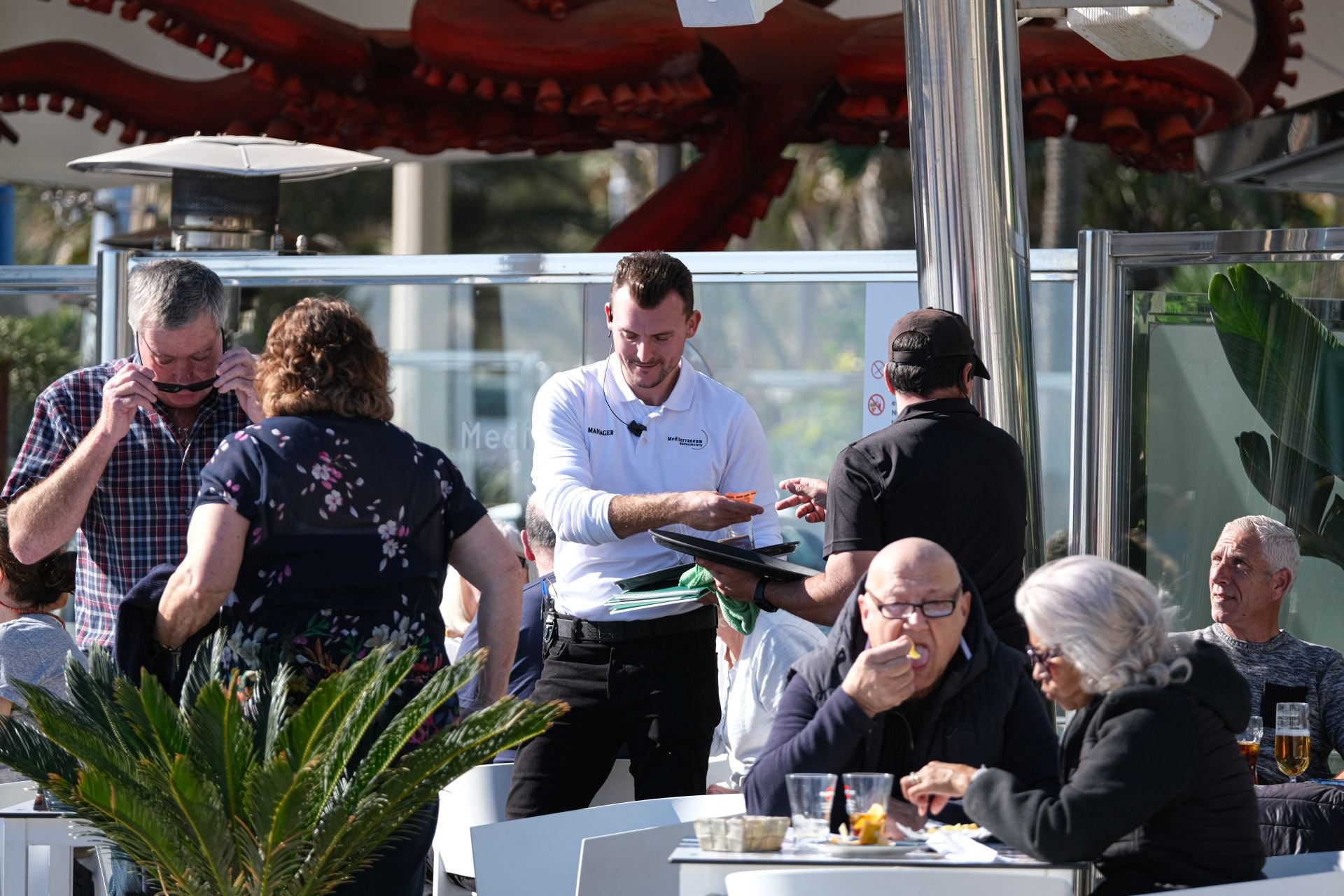 A waiter in a venue in the centre of Alicante.