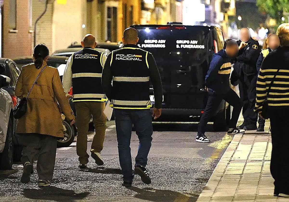Police officers at the crime scene on Wednesday night.